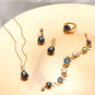 16" + 2" 14 Karat Gold Plated Mother of Pearl and Hematite Necklace