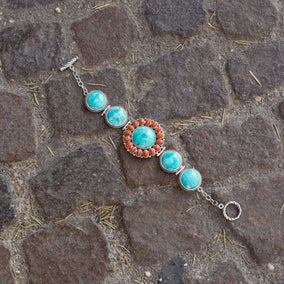 7.5" Reconstituted Turquoise and Coral Sunburst Toggle Bracelet