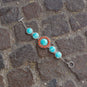 7.5" Reconstituted Turquoise and Coral Sunburst Toggle Bracelet